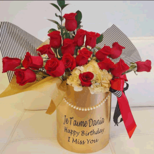 Red Flower Arrangement With A Touch Of Gold