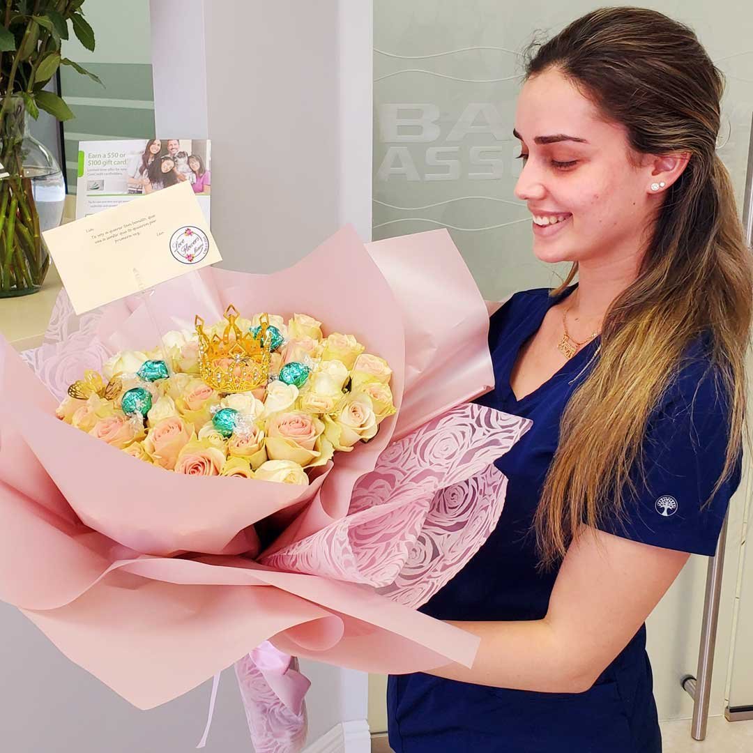 Luxurious 50 Pink Roses Bouquet Decorated With A Gold