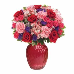 Beautiful Red Roses And Pink Carnation In A Vase